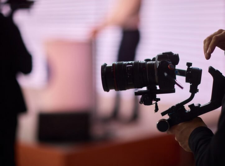 Closeup,Image,Showing,Someone,Gripping,A,Dslr,Camera,With,An